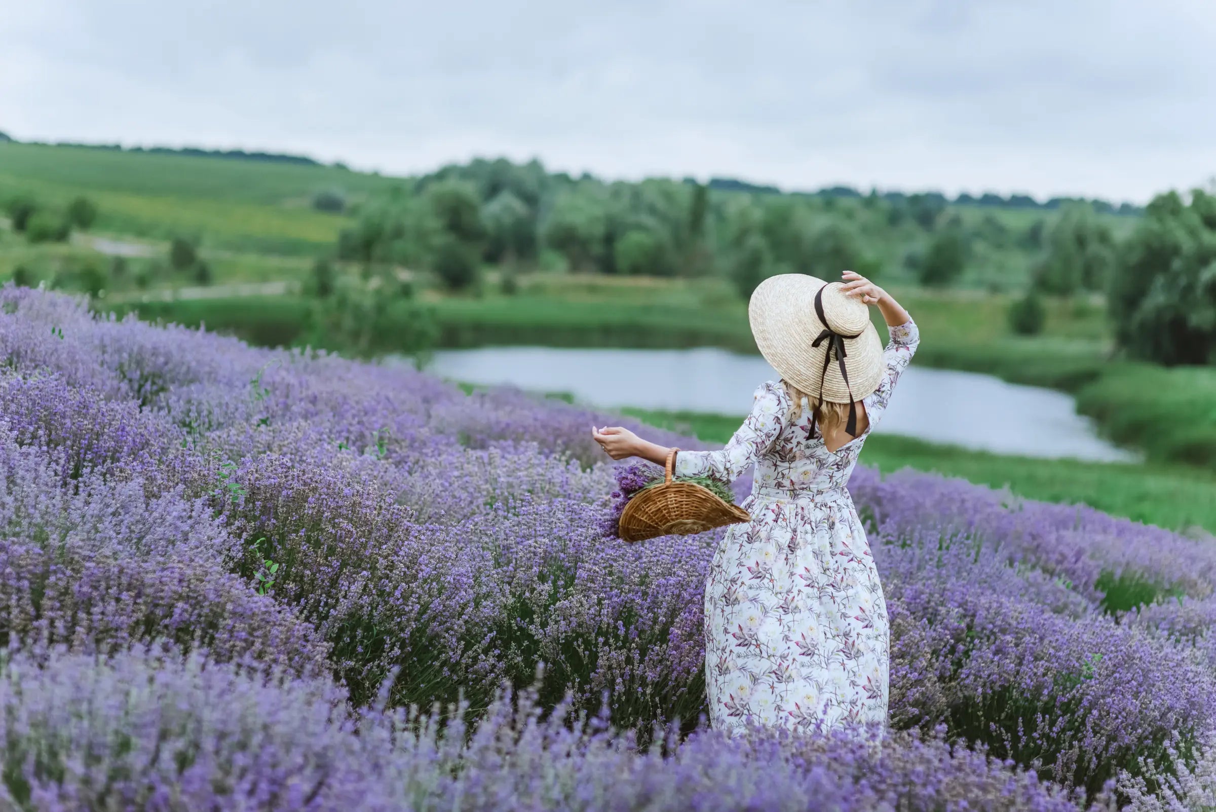 beautiful-woman-in-vintage-dress-harvesting-herbs